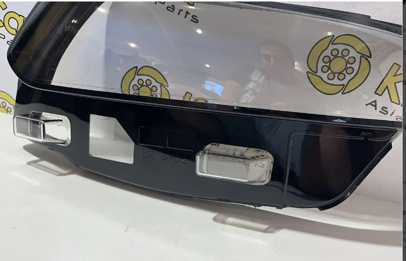 Стекло фары левое Geely Tugella новое